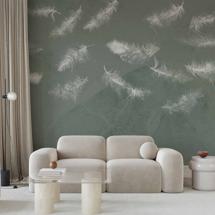 Wall Mural In flight - white feathers carried by the wind on an olive background with pattern 142639