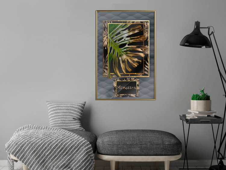 Poster Gilded Monstera - Composition with a tropical plant on a dark background 114359 additionalImage 5