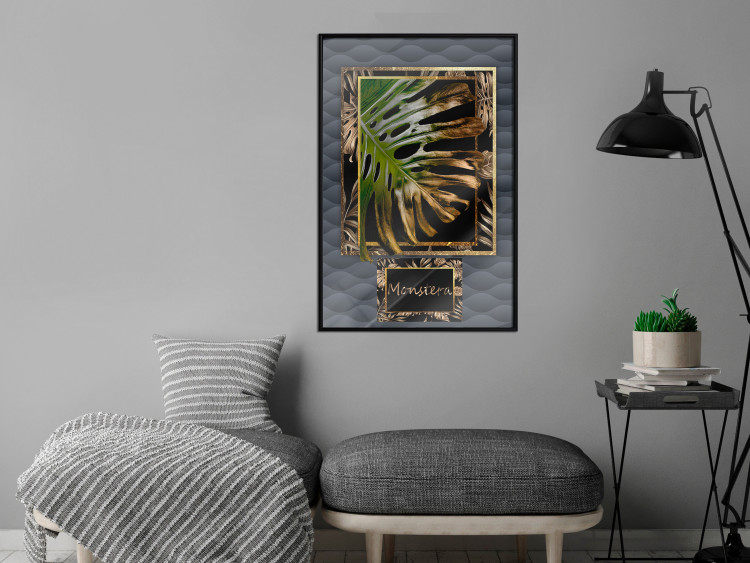Poster Gilded Monstera - Composition with a tropical plant on a dark background 114359 additionalImage 3