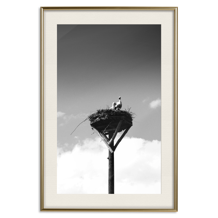 Wall Poster Stork's Nest - photograph of birds in a nest against a sky and clouds backdrop 122359 additionalImage 26