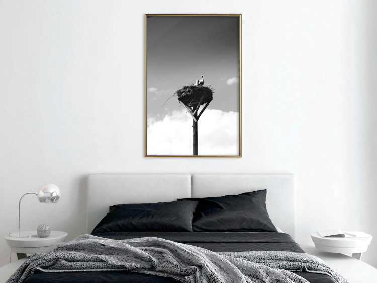 Wall Poster Stork's Nest - photograph of birds in a nest against a sky and clouds backdrop 122359 additionalImage 7