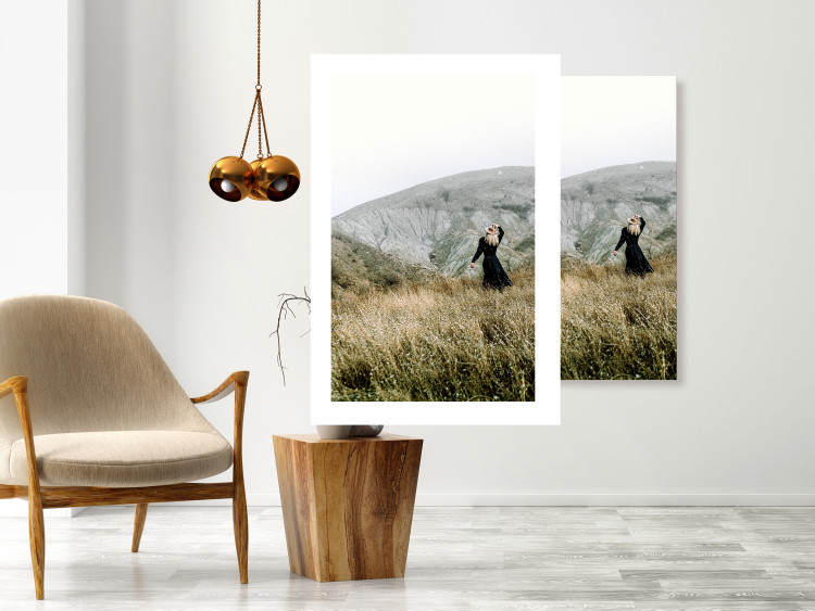 Wall Poster Lost in Nature - landscape of a meadow with a woman against a mountain range 130279 additionalImage 3