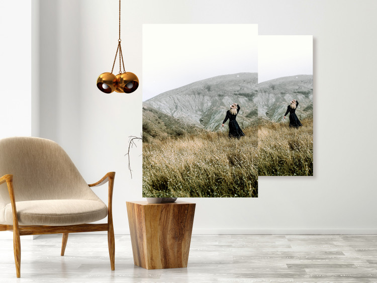 Wall Poster Lost in Nature - landscape of a meadow with a woman against a mountain range 130279 additionalImage 2