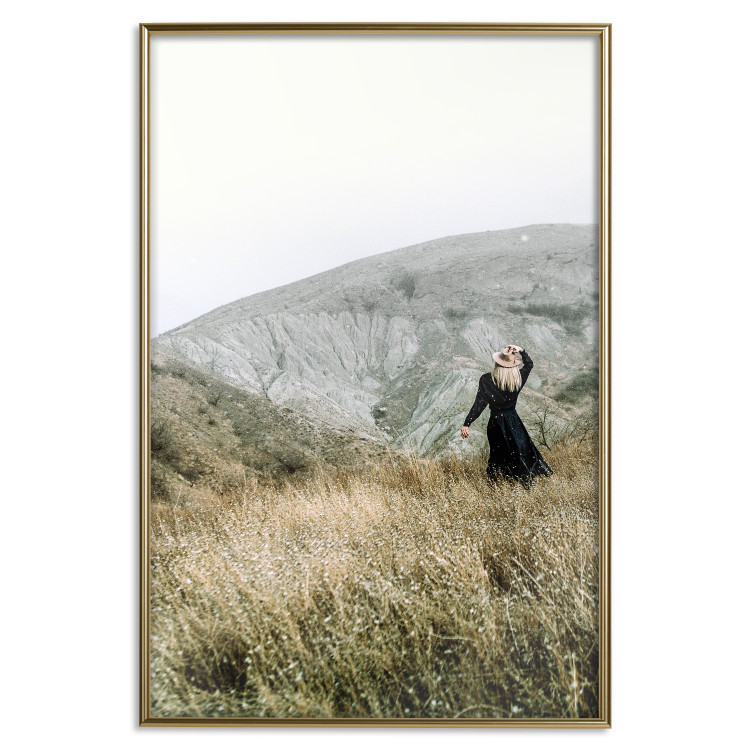 Wall Poster Lost in Nature - landscape of a meadow with a woman against a mountain range 130279 additionalImage 17