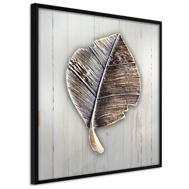 Poster Enchanted in Gold - autumn abstraction with a leaf on a light wood background 118789 additionalImage 10