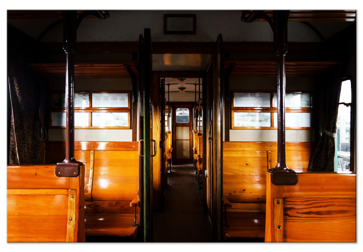 Canvas Print Passenger train - a photo from inside of a wagon with wooden benches 123799